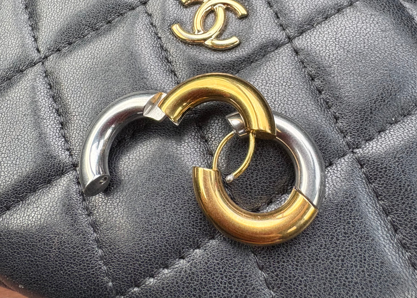Silver and gold earrings (design by Japan)