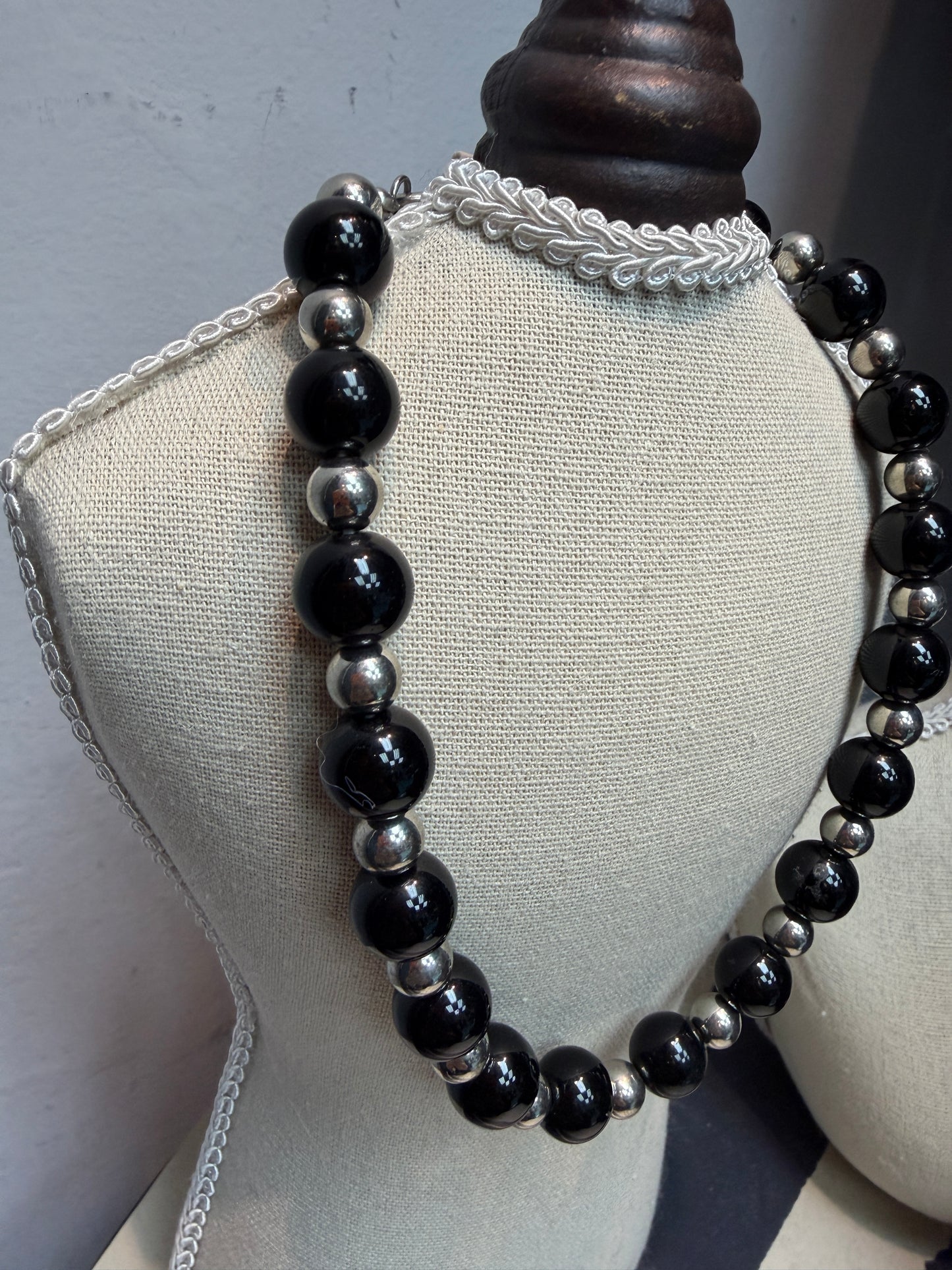 Silver X black beans necklace