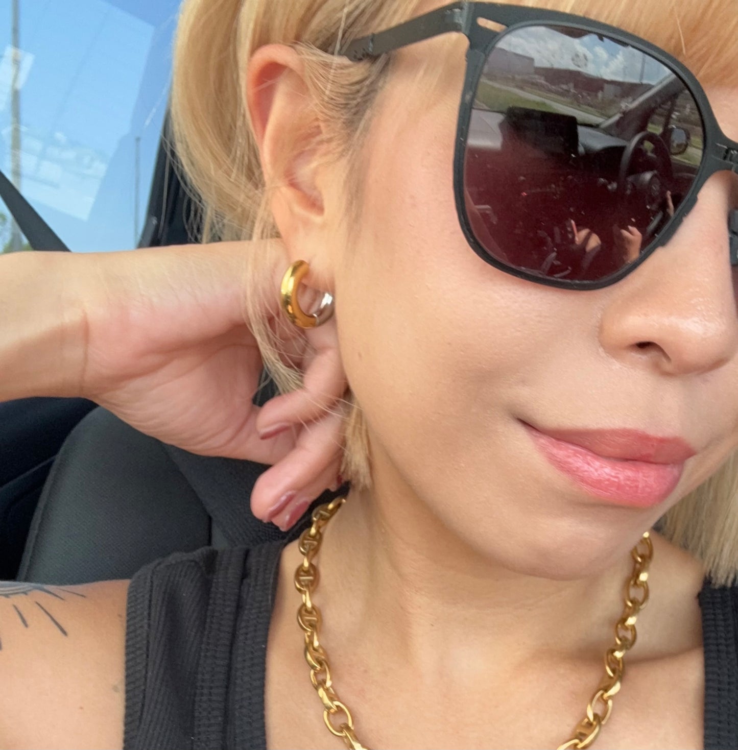 Silver and gold earrings (design by Japan)