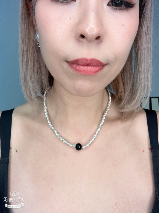 Black bead x silver necklace