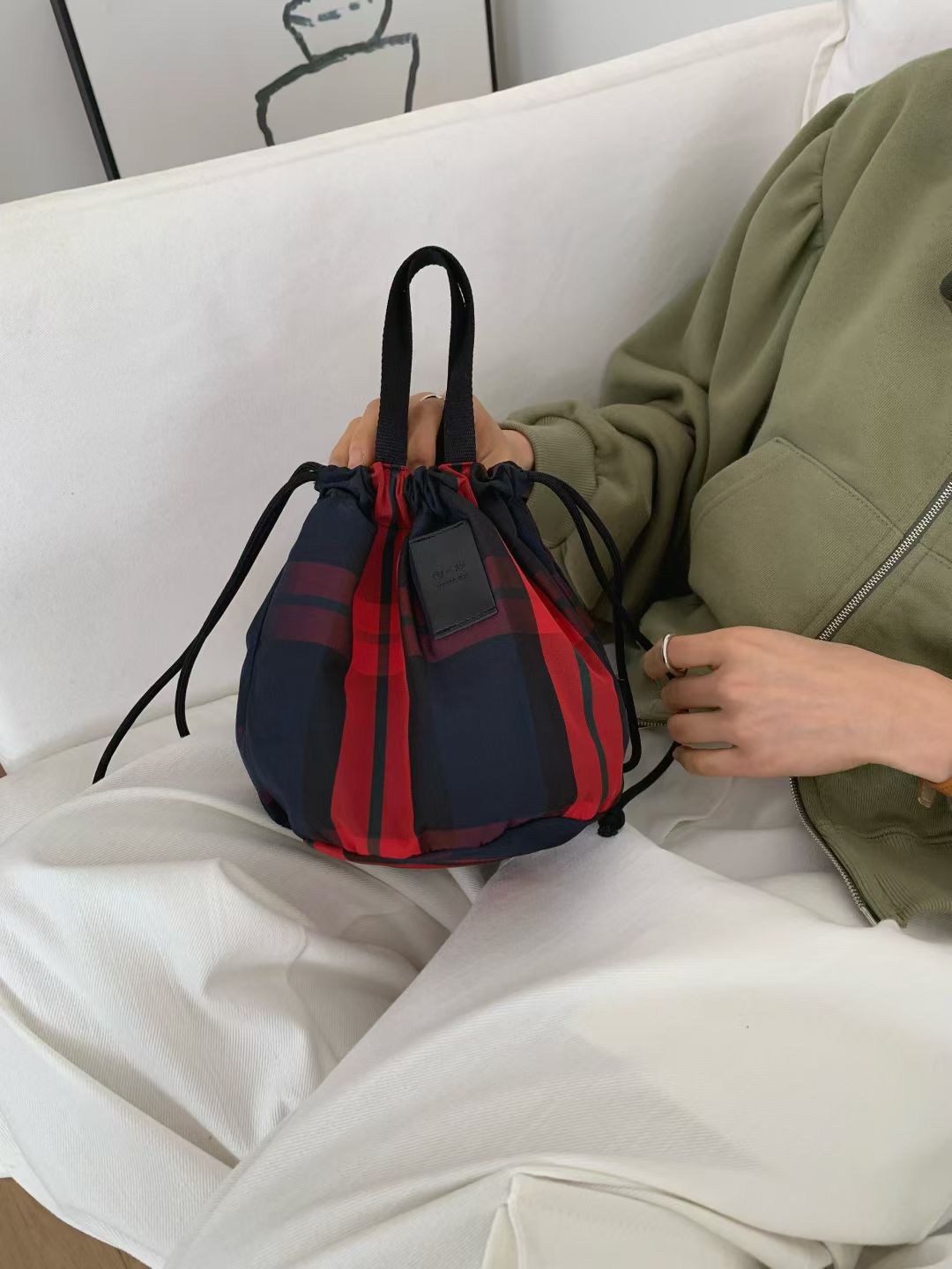 Checked drawstring bag