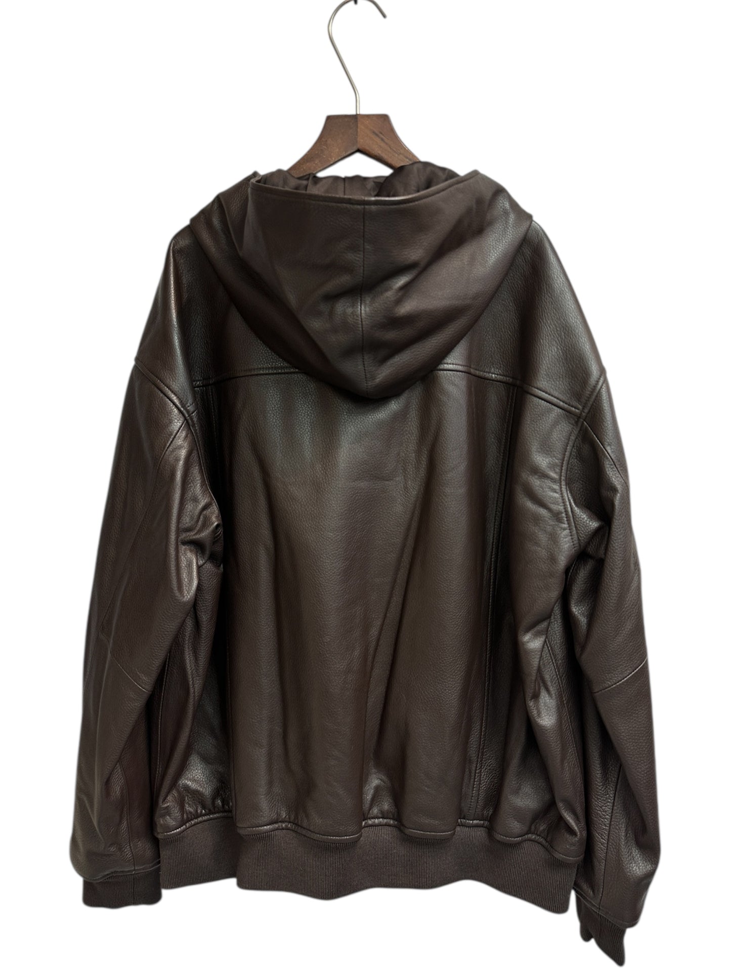 With hat leather jacket