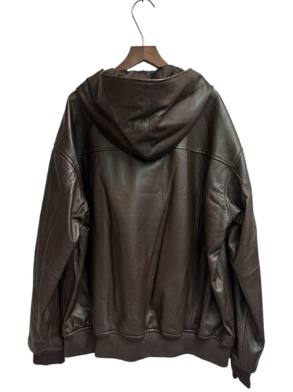 With hat leather jacket