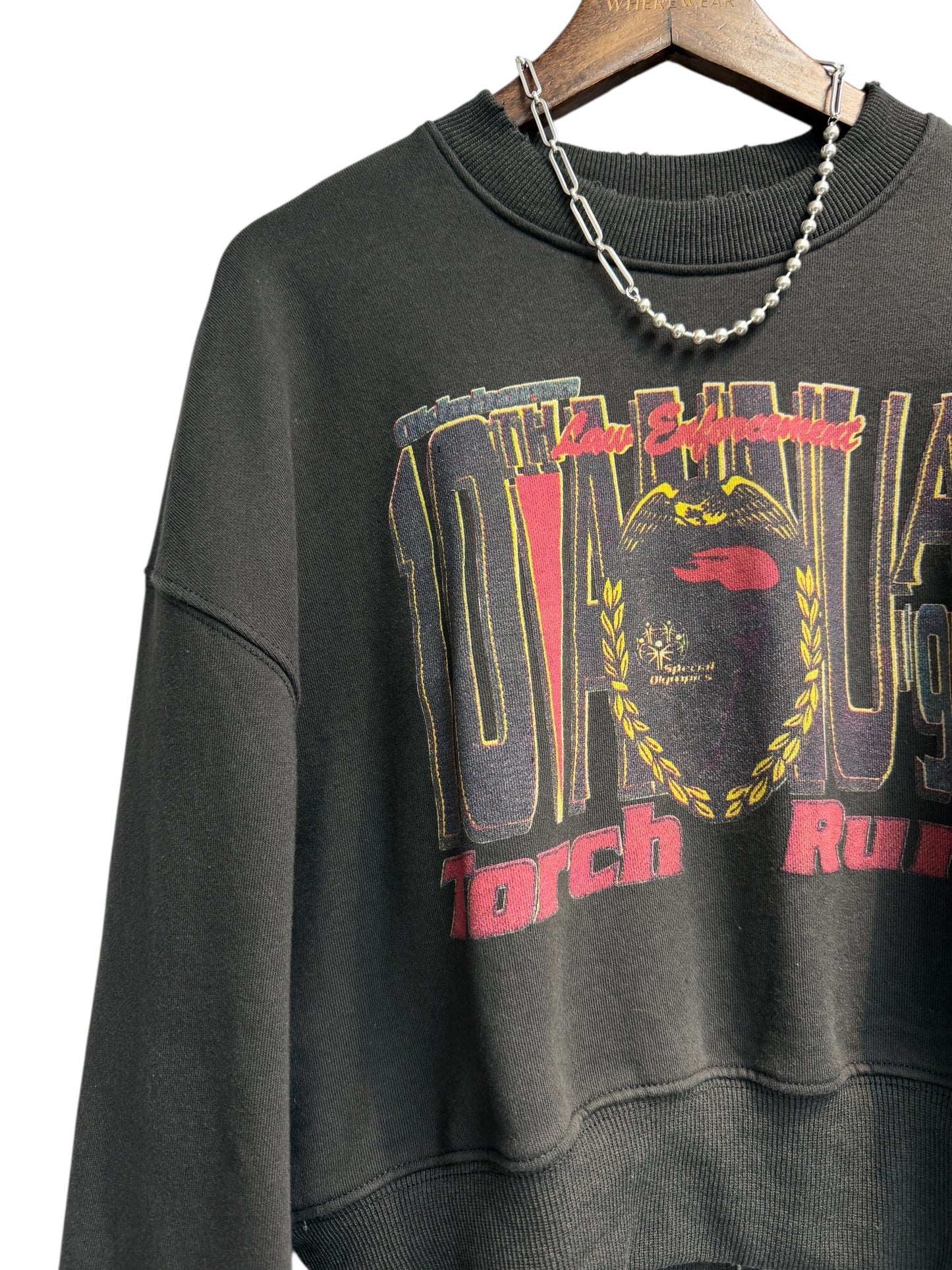 ‘Torch run’ printed sweater