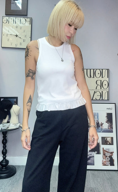 Ruffle hem vest