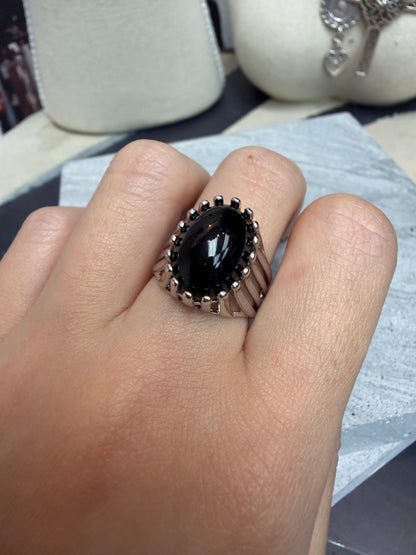 Black oval shape ring