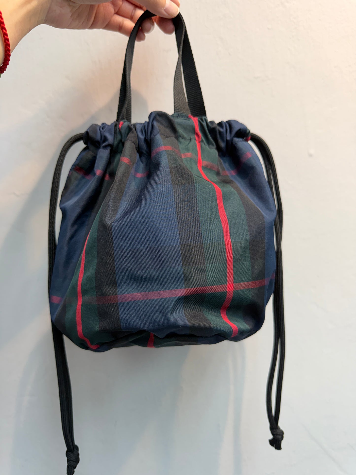 Checked drawstring bag