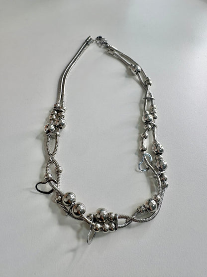 Global heart necklace ￼￼￼