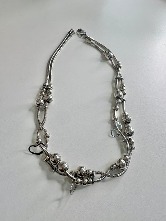 Global heart necklace ￼￼￼