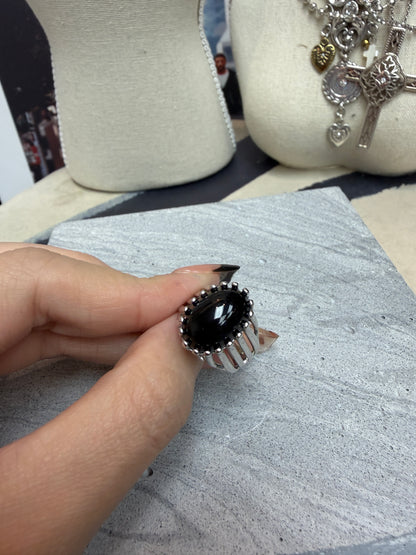 Black oval shape ring