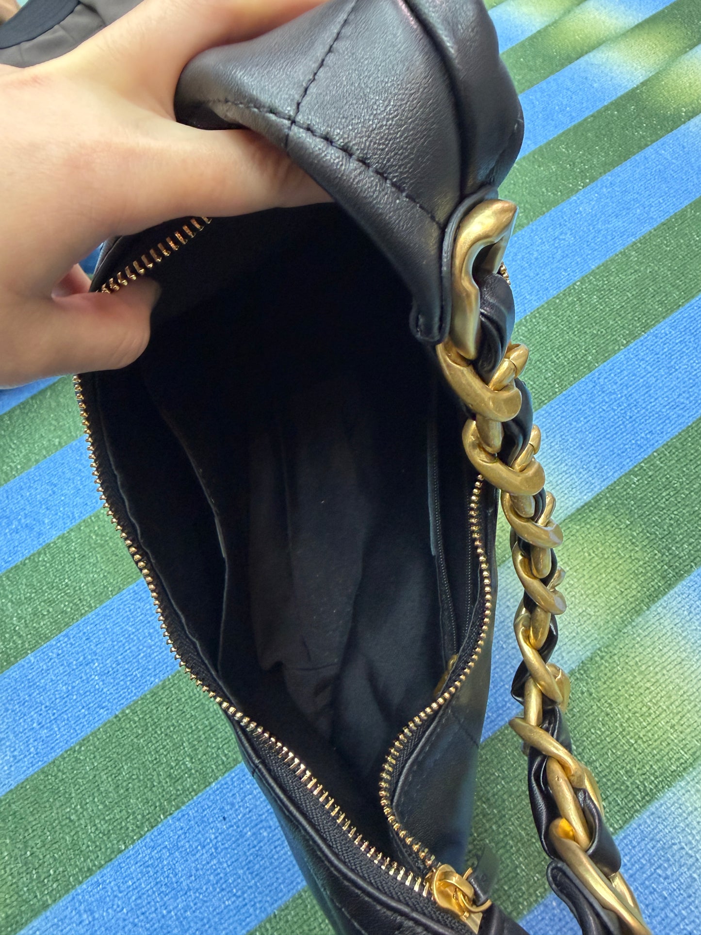 Gold chain handle leather bag