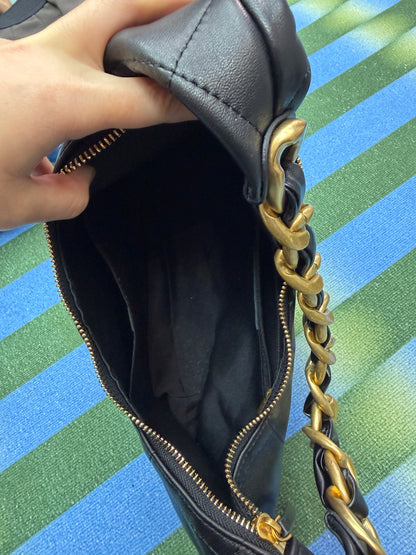 Gold chain handle leather bag