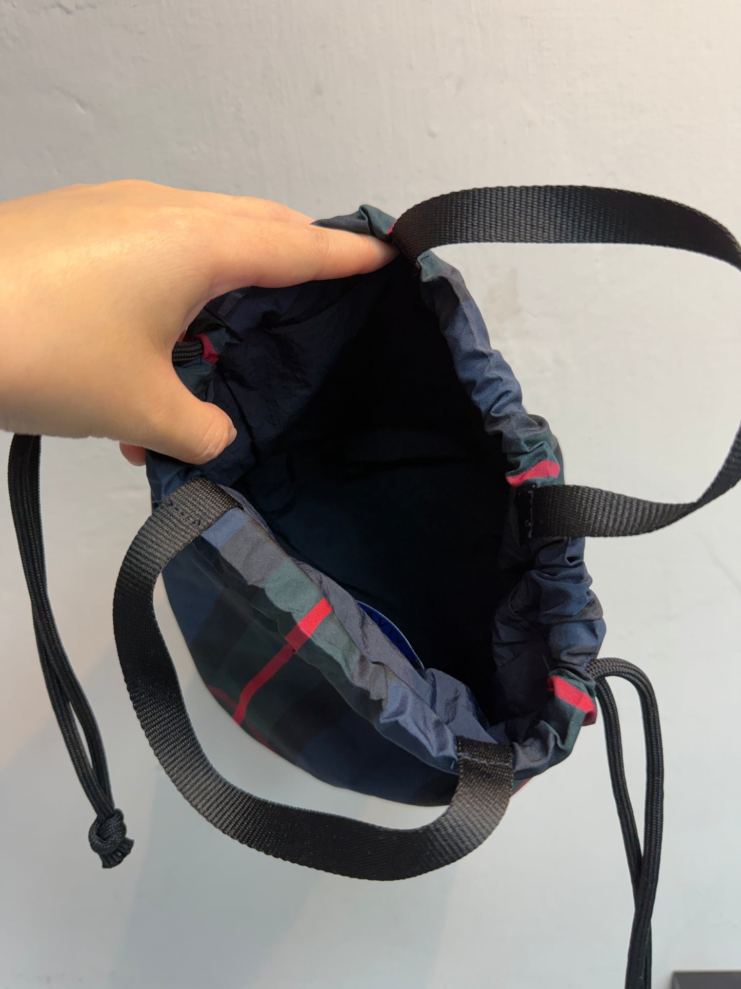 Checked drawstring bag