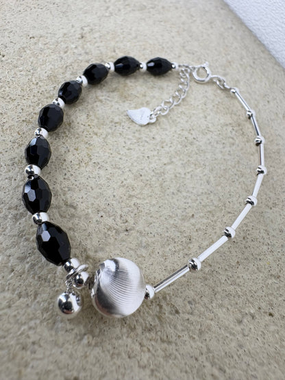 Mixed materials silver bracelet