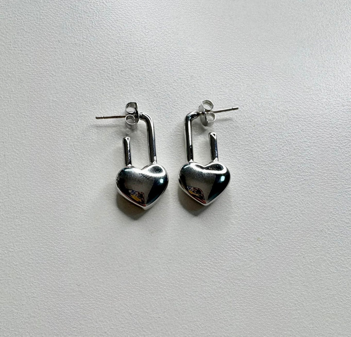 Heart lock shape earrings
